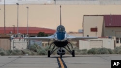 An AI-enabled U.S. Air Force F-16 fighter jet, the X-62A VISTA, taxies after an experimental flight on May 2, 2024, at Edwards Air Force Base, California. U.S. and Chinese officials are meeting in Switzerland on May 14 to discuss artificial intelligence security concerns.