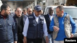 Director-General of the World Health Organization Tedros Adhanom Ghebreyesus walks at a hospital supported by Syrian American Medical Society, in Bab al-Hawa crossing at the Syrian-Turkish border, in Idlib governorate, Syria, March 1, 2023. 