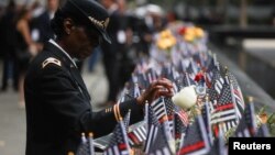 Colonel Davis attends a ceremony marking the 21st anniversary of the September 11, 2001 attacks on the World Trade Center at the 9/11 Memorial and Museum in the Manhattan borough of New York City, Sept. 11, 2022.
