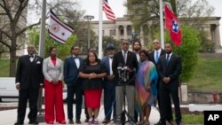 Members of the Tennessee Black Caucus of State Legislators outside the state Capitol, April 7, 2023, in Nashville, Tenn. the day after two of its members were expelled.