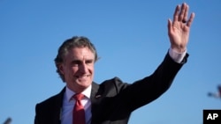 FILE - North Dakota Gov. Doug Burgum waves to the crowd at a rally in Wildwood, New Jersey, May 11, 2024.