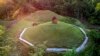 FILE - An aerial view of the Moidams burial mounds in Charaideo, in upper Assam, India, Sept. 27, 2022. The Charaideo Moidam royal burial complex and shrines, built by northeast India's Ahom dynasty, has been inscribed as a new World Heritage Site.