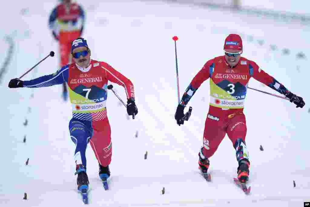 Second place, Norway&#39;s Paul Golberg, right, and third place, France&#39;s Jules Chappaz cross the finish line during the Men&#39;s Sprint Classic Final at the Nordic World Ski Championships in Planica, Slovenia