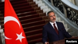 Turkish Foreign Minister Hakan Fidan attends a joint press conference with his Egyptian counterpart at Tahrir Palace in Cairo, Aug. 5, 2024. Fidan separately met his counterparts from Somalia and Ethiopia, Aug. 12, 2024, to narrow their distances to end the diplomatic dispute.