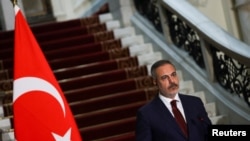 FILE - Turkish Foreign Minister Hakan Fidan attends a joint press conference with Egypt's Foreign Minister Badr Abdelatty, at Tahrir Palace in Cairo, Aug. 5, 2024. 