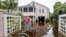 Robert Chesnut walks through water at his Palm Blvd. home after it was flooded by Tropical Storm Debby, Aug. 8, 2024, in Isle of Palms, South Carolina.