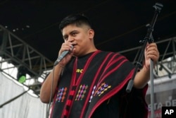 Mexican-Triqui artist Carlos CGH performs at the Zocalo in Mexico City, Aug. 6, 2024.