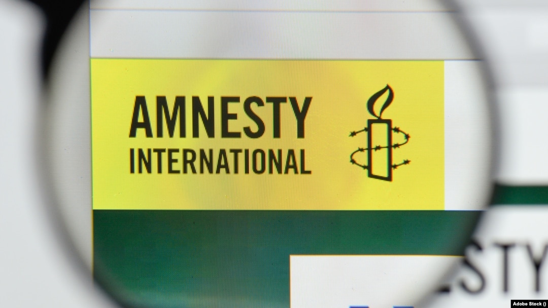 Logo organizacije Amnesti internešnal, arhiva