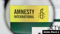 Фото: логотип Amnesty International