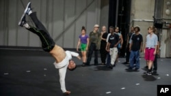 Dancers rehearse for "Dance of the Games" at the concert hall in Creteil, east of Paris, July 31, 2024. 