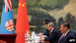 Chinese President Xi Jinping speaks during a meeting with Fiji's Prime Minister Sitiveni Rabuka at the Great Hall of the People in Beijing on August 20, 2024. 