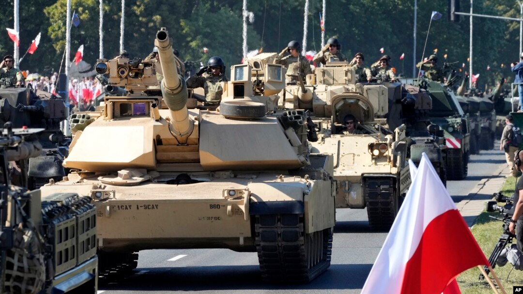 U.S.-made Abrams tanks purchased by Poland take part in a massive military parade to celebrate the Polish Army Day, commemorating the 1920 battle in which Polish troops defeated advancing Bolshevik forces, in Warsaw, Poland, Aug. 15, 2023.