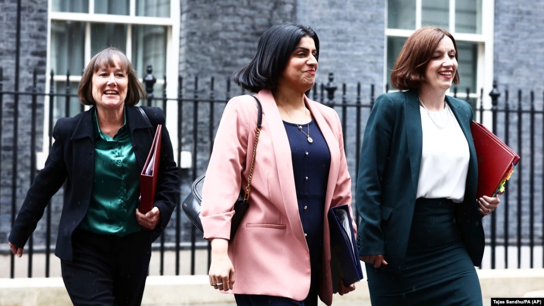 Britain's Welsh Secretary Jo Stevens, left, Justice Secretary Shabana Mahmood, center, and Education Secretary Bridget Phillipson leave 10 Downing Street, London, July 6, 2024, after Prime Minister Starmer's first Cabinet meeting.