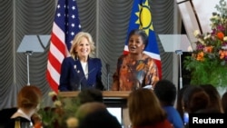 First lady of Namibia, Monica Geingos, introduces U.S. first lady Jill Biden at the State House in Windhoek, Namibia, Feb. 23, 2023.
