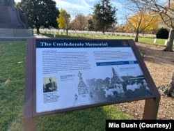 A sign explaining the history of the Confederate Memorial at Arlington National Cemetery in Virginia. The monument will soon be removed.