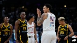 Phoenix Mercury center Brittney Griner (42) applauds on the court before a WNBA basketball game against the Los Angeles Sparks in Los Angeles, May 19, 2023.