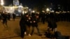 Protesters are detained by plain clothes police during a rally against what election observers said were widespread vote irregularities during a general election a week ago, in downtown Belgrade, Serbia, Dec. 24, 2023. 