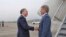 FILE - Taiwanese Vice Minister of Foreign Affairs Alexander Tah-ray Yui shakes hands with Michael McCaul, the chairman of the U.S. House Foreign Affairs Committee, at an airport in Taiwan in this handout released April 6, 2023. 