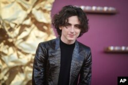 Aktor Timothee Chalamet pemeran Willy Wonka di acara pemutaran perdana film "Wonka" di California (dok: Richard Shotwell/Invision/AP)