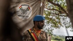 FILE —A peacekeeper from the United Nations Organization Mission for the Stabilization of the Congo (MONUSCO) stand at their base in Kamanyola, eastern Democratic Republic of Congo on February 28, 2024. 