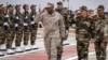 FILE - Moroccan and AFRICOM commanders review an honor guard during an exercise in Morocco, May 31, 2024. AFRICOM’s deputy legal counsel, retired Col. Max Maxwell, says it is critical to ensure the rule of law is followed when troops are deployed.