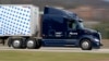 A self-driving tractor-trailer maneuvers around a test track in Pittsburgh, Thursday, March 14, 2024. (AP Photo/Gene J. Puskar)