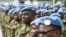 FILE - Members of the U.N. Multidimensional Integrated Stabilization Mission in Mali (MINUSMA) stand during a ceremony at Camp Gallieni in Abidjan, Jan. 24, 2023.