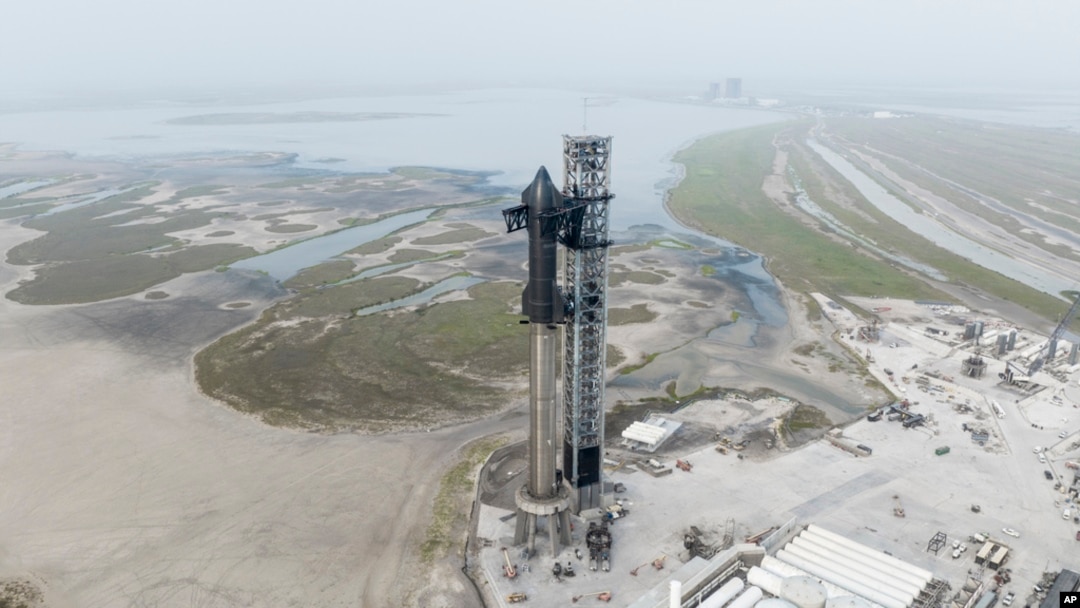 FILE: This undated photo provided by SpaceX shows the company's Starship rocket at the launch site in Boca Chica, Texas.