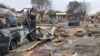 FILE - Destruction is seen across a livestock market area in El Fasher, the capital of Sudan's North Darfur state, Sept. 1, 2023. 
