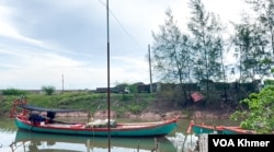 A coal storage is seen on the Kampot Multi-Purpose Port, in Kilo 12 Village, Sangkat Koh Touch, Bokor City, Kampot Province on May 26, 2024. (Kann Vicheika/VOA Khmer)