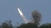 FILE - A U.S. M142 High Mobility Artillery Rocket System (HIMARS) fires a missile during a military exercise in the Philippines, April 26, 2023. The U.S. is providing to Ukraine about $300 million in an aid package expected to include artillery rounds and rockets for the HIMARS.