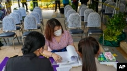 Potential candidates to become members of Thailand's next Senate arrive at the Phaya Thai district office in Bangkok, May 20, 2024.