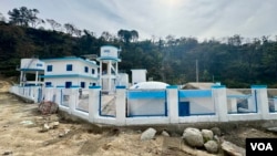This water storage and treatment plant will supply water to about ten villages. (Rakesh Kumar/VOA)