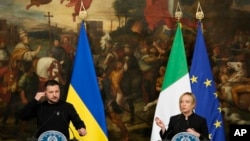 Italian Premier Giorgia Meloni, right, and Ukrainian President Volodymyr Zelenskyy at a news conference after their meeting at Chigi Palace, in Rome, May 13, 2023.