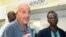 FILE - Pathologist Dr. Cyril Wecht, center, talks to the media outside the Rand Laboratory morgue at the Princess Margaret Hospital in Nassau, Bahamas, Sept. 17, 2006. Wecht, a controversial pathologist and attorney, died May 13, 2024.