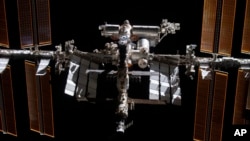 FILE - This photo provided by NASA shows the International Space Station from the SpaceX Crew Dragon Endeavour during a fly around of the orbiting lab, Nov. 8, 2021. 
