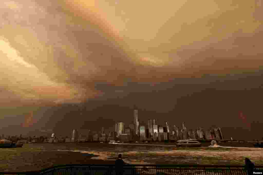 A rainbow is seen over the One World Trade Center on the day of the 22nd anniversary of the September 11, 2001, attacks, viewed from Jersey City, New Jersey, Sept. 11, 2023. REUTERS/Jeenah Moon