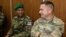 Botswana Defense Forces 1st Lieutenant Maria Gabaikanngwe and U.S. Army Master Sergeant Hernan Briones take part in a planning meeting for the South Accord 2024 exercises in Gaborone, Botswana, on June 19, 2024. The exercises, in Botswana, wrap up on Aug. 15, 2024.