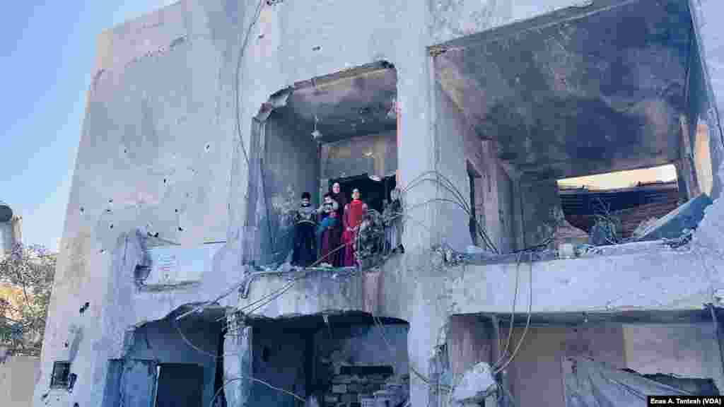 Many families live in buildings damaged by the war, in Rafah, Gaza, in Feb. 2024. 