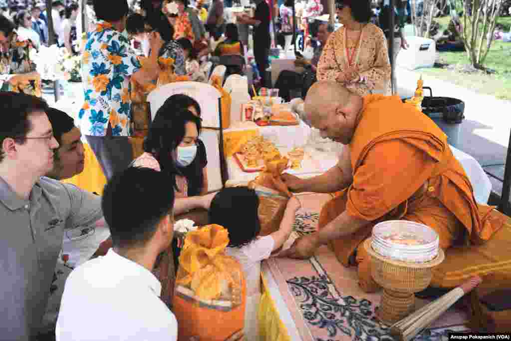 People participated in Songkran Festival at WAT Thai Washington. D.C, April 16, 2023.