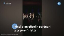 İkinci olan güzelin partneri tacı yere fırlattı 