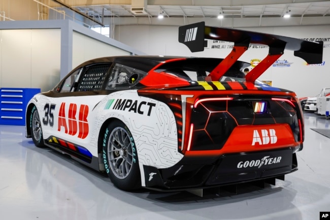 A prototype of the first electric racecar is displayed at the NASCAR R&D Center in Concord, N.C., Monday, July 1, 2024. (AP Photo/Nell Redmond)