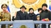 In this photo provided by the North Korean government, Kim Jong Un, center left, and his daughter attend a military parade to mark the 75th founding anniversary of the Korean People’s Army on Kim Il Sung Square in Pyongyang, North Korea, Feb. 8, 2023.