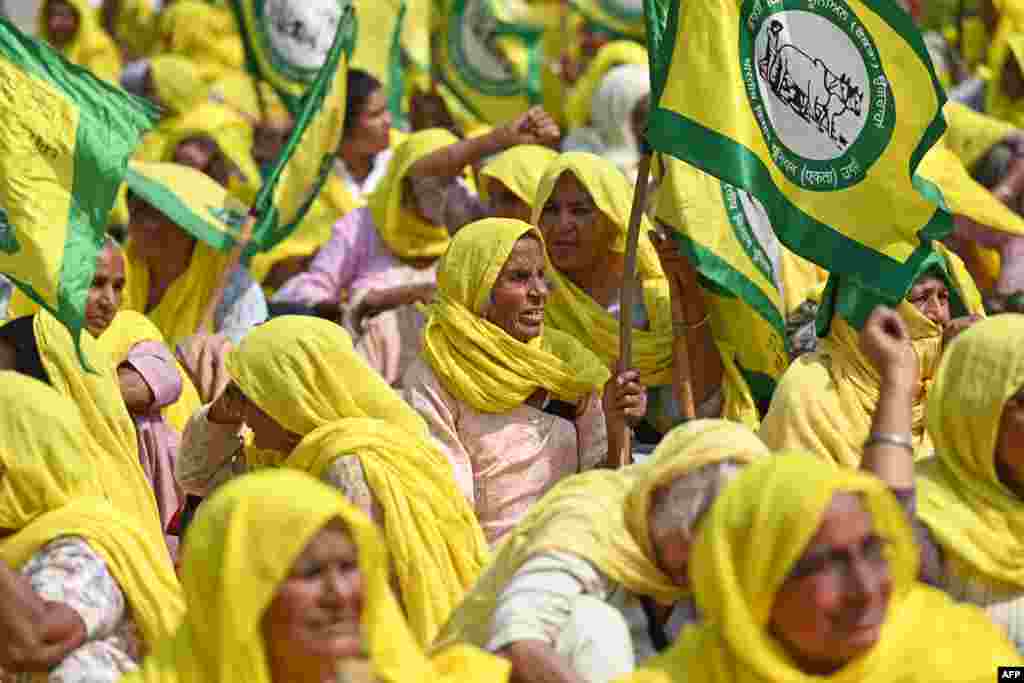 Farmers take part in a sit-in protest demanding minimum crop prices, loan waivers and an investigation into the death of a farmer during the farmers' protest "Delhi Chalo," or "March to Delhi," at Ram Lila ground in New Delhi.