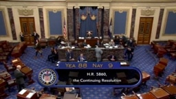 这张来自美国参议院视频的图片显示了2023年9月30日在华盛顿美国国会大厦参议院对临时拨款法案的投票总数为88-9。(Senate Television via AP)