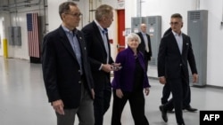 FILE - U.S. Treasury Secretary Janet Yellen (center) visits solar cell company Suniva in Norcross, Georgia, March 27, 2024.