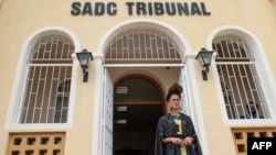 FILE - Trans activist Mercedez von Cloete is pictured at the Namibian High Court in Windhoek, Nov. 12, 2021. Von Cloete says the LGBTQ+ community is at risk of targeted violence if the court repeals a sodomy law.