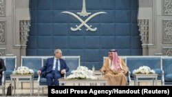 Waleed El Khereiji, right, Saudi deputy foreign minister, meets with Faisal Mekdad, Syria's minister of foreign affairs and expatriates, in Jeddah, Saudi Arabia, April 12, 2023.