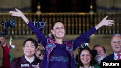 Presidential candidate of the ruling Morena party Claudia Sheinbaum gestures while addressing her supporters after winning the presidential election, at Zocalo Square in Mexico City, June 3, 2024. 