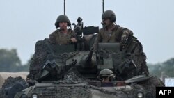 US Marine officers take part in the Combined Arms Live Fire Exercise (CALFEX) as part of the annual naval exercises between the Philippine Marine Corps and US Marine Corps at Capas, Tarlac province Oct. 13, 2022.